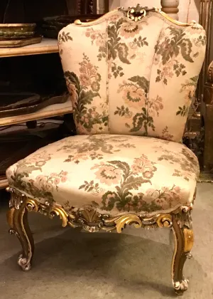 1940s French Slipper Upholstered and Parcel-gilt Chair With Floral Motifs